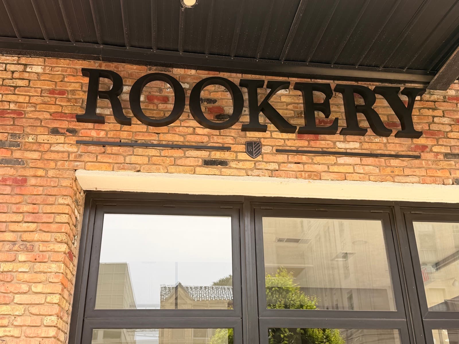 The Rookery signage on the historic brick exterior